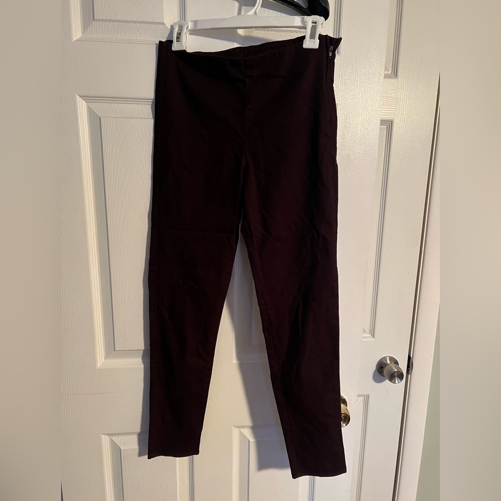 Burgundy with a hint of black Divided pants. Size 10